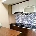 Best Deal And Homey 1Br Apartment Grand Sentraland Karawang By Travelio